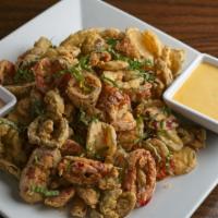 Pickles And Peppers · Sliced dill pickles and cherry peppers deep fried. Served with spicy ranch