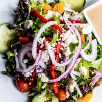 Greek  · Mixed greens, romaine, feta, Kalamata olives, cucumber, tomato, bell pepper and red onion. S...