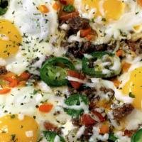 Makhlma / مخلمة · Eggs with beef and celery and onions and green pepper.