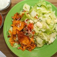 Dinner Salad · Crisp garden lettuce, tomatoes, onions, and carrots tossed fresh.