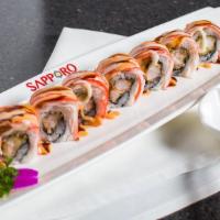 Shaggy Dog Roll (8) · Shrimp tempura topped with crab, spicy mayo and eel sauce.