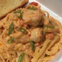 Cajun Pasta · Sautéed Shrimp and Crawfish Tails in Cajun Alfredo sauce,  Rich Parmesan and fettuccine nodd...