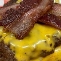 Double Bacon Cheese Burger · 2 angus patties topped with American cheese and Applewood Bacon. Dressed with Mayo, Lettuce,...
