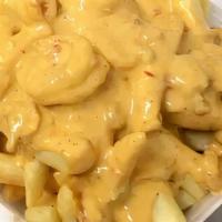 Bayou Fries-Regular · French Fries topped with a cajun cheese sauce, sautéed crawfish tails and Shrimp!