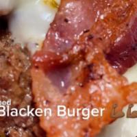 Blacken Burger · Blacken Angus Beef topped with Pepper Jack Cheese and Applewood Bacon. Dressed with Spicy Ma...