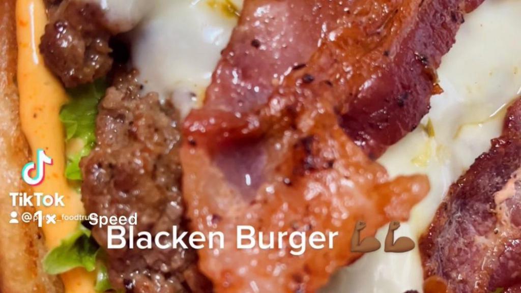 Blacken Burger · Blacken Angus Beef topped with Pepper Jack Cheese and Applewood Bacon. Dressed with Spicy Mayo, Lettuce, Tomatoes and Pickles