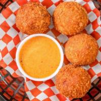 Crab Peak Poppers (4) · Stuffed with bacon, cheese & jalapeños.