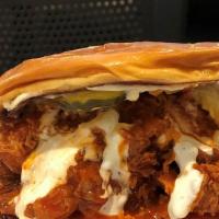 Buffalo Chicken Sandwich · Hand breaded fried chicken breast, provolone cheese, pickles, buffalo sauce, mayo & ranch dr...