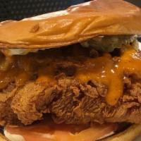 Crispy Chicken Sandwich · Hand breaded fried chicken breast, pickle, mayo & old bay sauce.  Served with fries or add $...