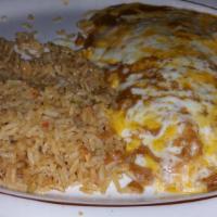 No Mas Dinner · Two cheese enchiladas topped with gravy & melted cheese,  a tamale topped with chili con car...