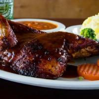 Chicken Dinner · Half Portion of Smoked BBQ Chicken Topped With Our Homemade BBQ Sauce and Two Side Orders of...
