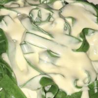 Spinach Fettuccine Alfredo · With sauteed mushrooms, add chicken or shrimp