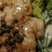Chicken Picatta · Sauteed with white wine butter sauce, choice of pasta or garlic mashed potatoes.