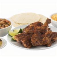 Half Grilled Chicken · Four pieces of our Mesquite Grilled Chicken. Served with medium sides of Rice and Charro Bea...