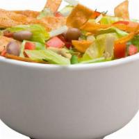 Salad · A fresh salad made with Lettuce, Pico de Gallo, Charro Beans, Tortilla Strips, and Shredded ...