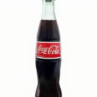Mexican Coke · A 1/2 liter bottle of Mexican Coke.