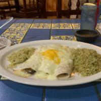 Spinach Enchiladas · (3) spinach and mushroom enchiladas covered in a cream of mushroom sauce and topped with bot...