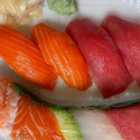 Sushi Combo 3 · Rainbow roll with 4 pieces nigiri