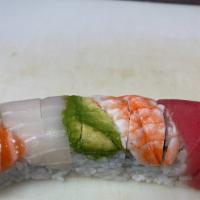 Rainbow Roll · California roll topped with salmon, tuna, snapper, avocado, and shrimp.