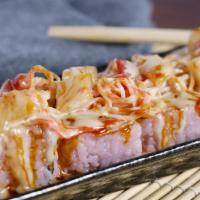 Sushi Go · California roll topped w/ tuna, white tuna,crab 
*sweet house sauce, eel sauce