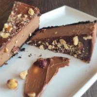 Nutella Cheesecake Slice · Contains Nuts. Nutella and cream cheese blend perfectly together yielding an indulgent chees...