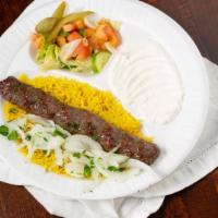 Mixed Kabab Plate · One skewer each beef tenderloin, kofta kabob and shish tawook served with hummus, pickles an...