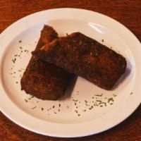 Alcapurrias De Carne · Stuffed fritter made with green banana and beef