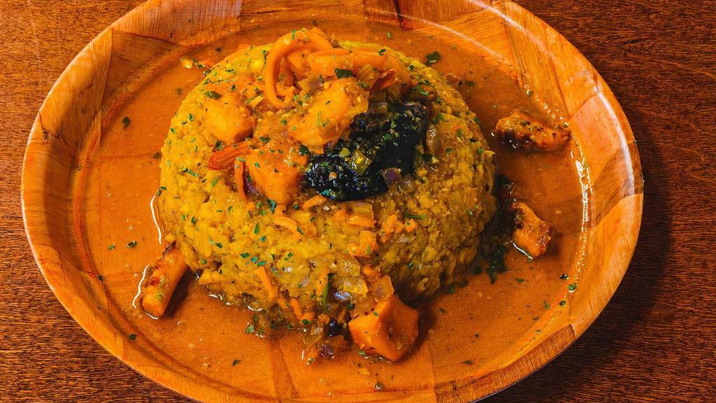 Mofongo De Mariscos · Mashed green plantain filled with shrimp, octopus, fish, mussel's squid
