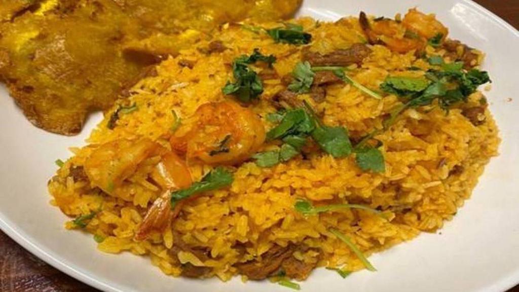 Mar Y Tierra · Yellow rice with shrimp and  skirt steak.