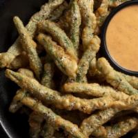 Crispy Green Beans · Tempura-battered, signature spicy dipping sauce. Platter serves 6-8. *These items are cooked...
