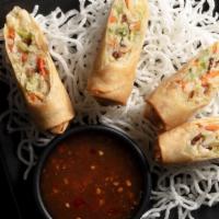 Vegetable Spring Rolls · Crispy rolls with julienned veggies, sweet chili dipping sauce. Platter includes 24 pieces. ...