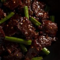 Mongolian Beef · Sweet soy glaze, flank steak, garlic, snipped green onion. Platter serves 6-8. *These items ...