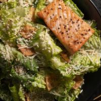 Asian Caesar Salad · Platter serves 6-8. Romaine, parmesan, toasted sesame seeds, wonton croutons.