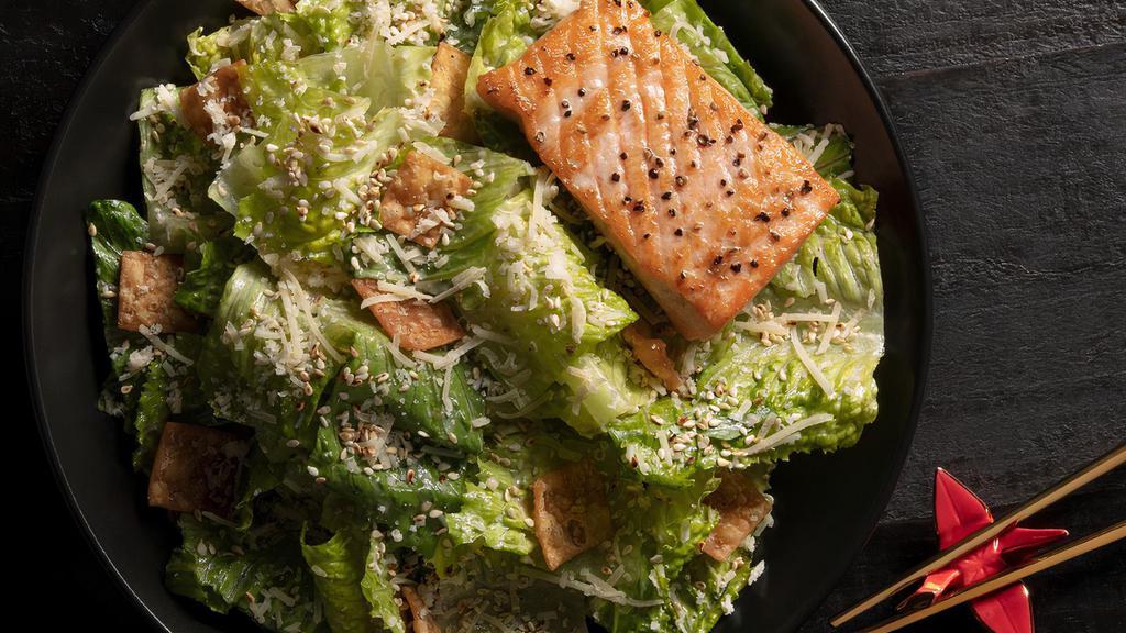 Asian Caesar Salad · Platter serves 6-8. Romaine, parmesan, toasted sesame seeds, wonton croutons.