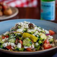 Cucumber & Feta Salad (Side) · Fresh Italian herbs, sliced cucumber with feta cheese, Roma tomatoes, red onions, Kalamata o...