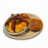 Ol' Number 7 · The Ol' Number 7 is back! One biscuit, three scrambled eggs, bacon and hash browns smothered...