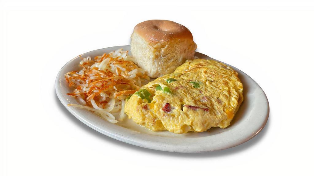 Western Omelet · Made with smoked ham, onions, Cheddar cheese and bell peppers.
