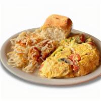 Veggie Omelet · Made with mushrooms, onions, bell pepper, tomato and Swiss cheese.