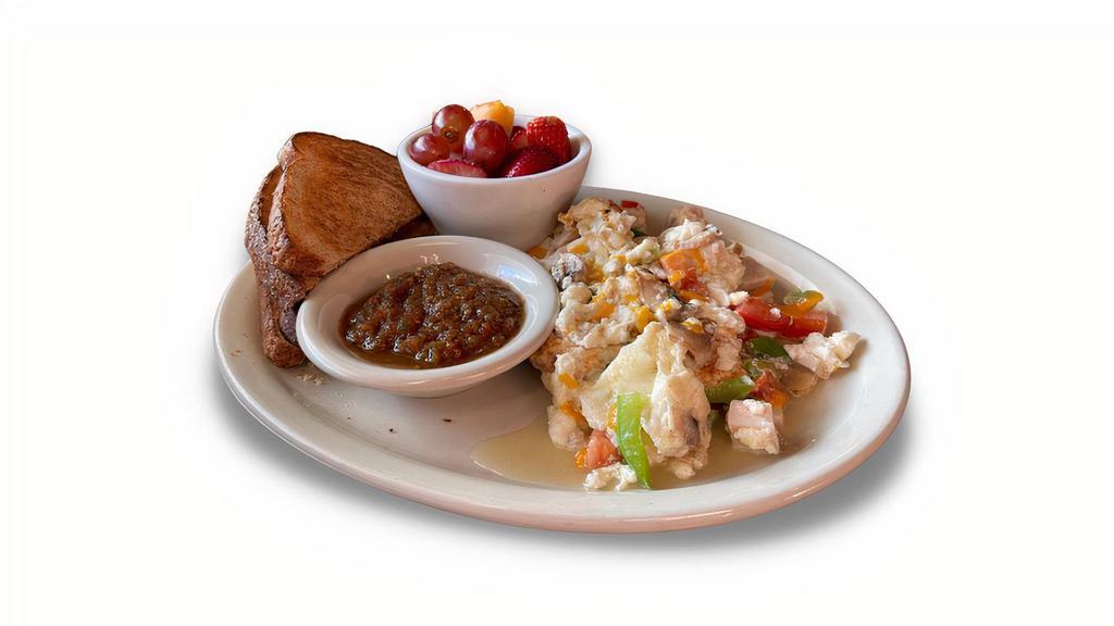 Texas Trainer'S Scramble · Scrambled egg whites with smoked turkey, mushrooms, onions, bell peppers, tomatoes, Cheddar cheese and topped with freshly made salsa. Served with a cup of fruit and whole wheat toast.