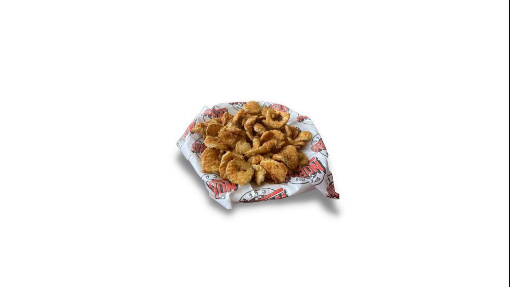 Fried Pickles · Dill pickle chips lightly battered and fried golden brown, served with homemade ranch dressing.
