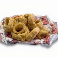 Onion Rings · Norma's Cafe 1/2 pound of hand-battered onion rings made the old-fashioned way and fried gol...