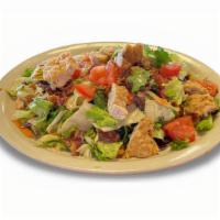 Crispy Chicken Chopped Club Salad · Crispy chicken, bacon, boiled eggs, tomatoes and homemade croutons. Chopped and tossed in ou...