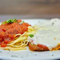 Eggplant Parmigiana · Lightly breaded eggplant, topped with tomato sauce and Mozzarella cheese served with a side ...