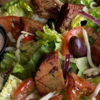 Greek Salad (Half) · Crisp green romaine lettuce, juicy red tomatoes, crispy onions, feta cheese and kalamata oli...