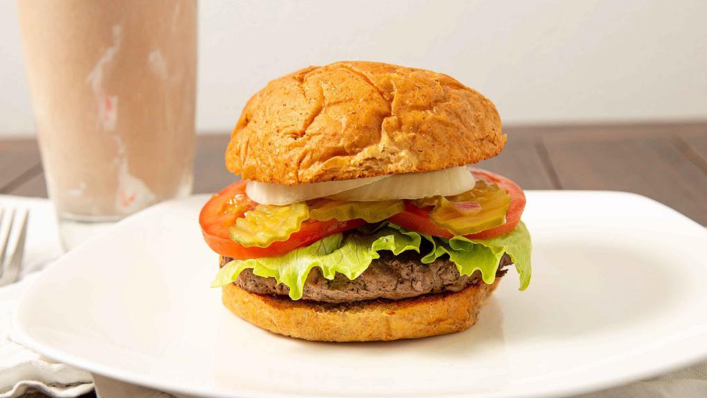 Elk Burger · Antibiotic-free, hormone-free, pasture-raised, 100% all-natural.  Served with lettuce, tomatoes, onion and pickles on the side.