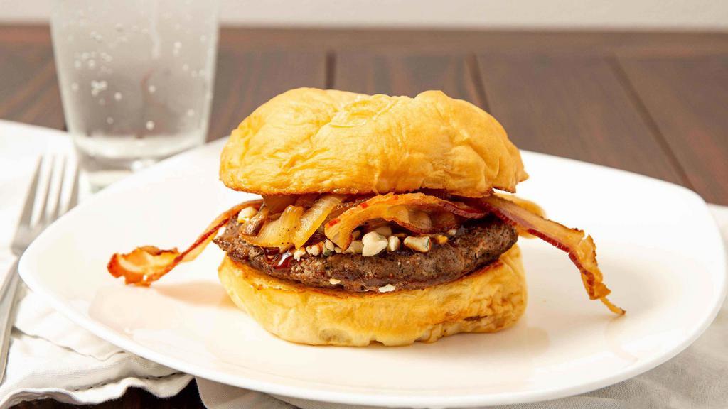 Bourbon Burger · Sweet bourbon sauce, smokehouse bacon, bourbon caramelized onions, bleu cheese.
