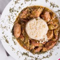Seafood Gumbo · A taste of louisiana homemade roux with sausage and shrimp served over a bed of rice.