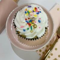 Birthday Cake Cupcake · Confetti cake topped with vanilla buttercream and colorful sprinkles