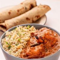 Chicken Tikka Masala Bowl · Legendary North Indian tomato sauce with a touch of cream.  Spice Level: Medium