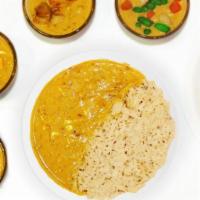 Punjabi Kadhi · Protein of your choice marinated in a tangy sauce with yogurt and chickpea-flour. Spice Leve...